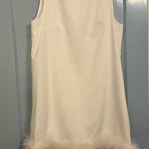 Elegant White Sleeveless Dress with Feather Hem